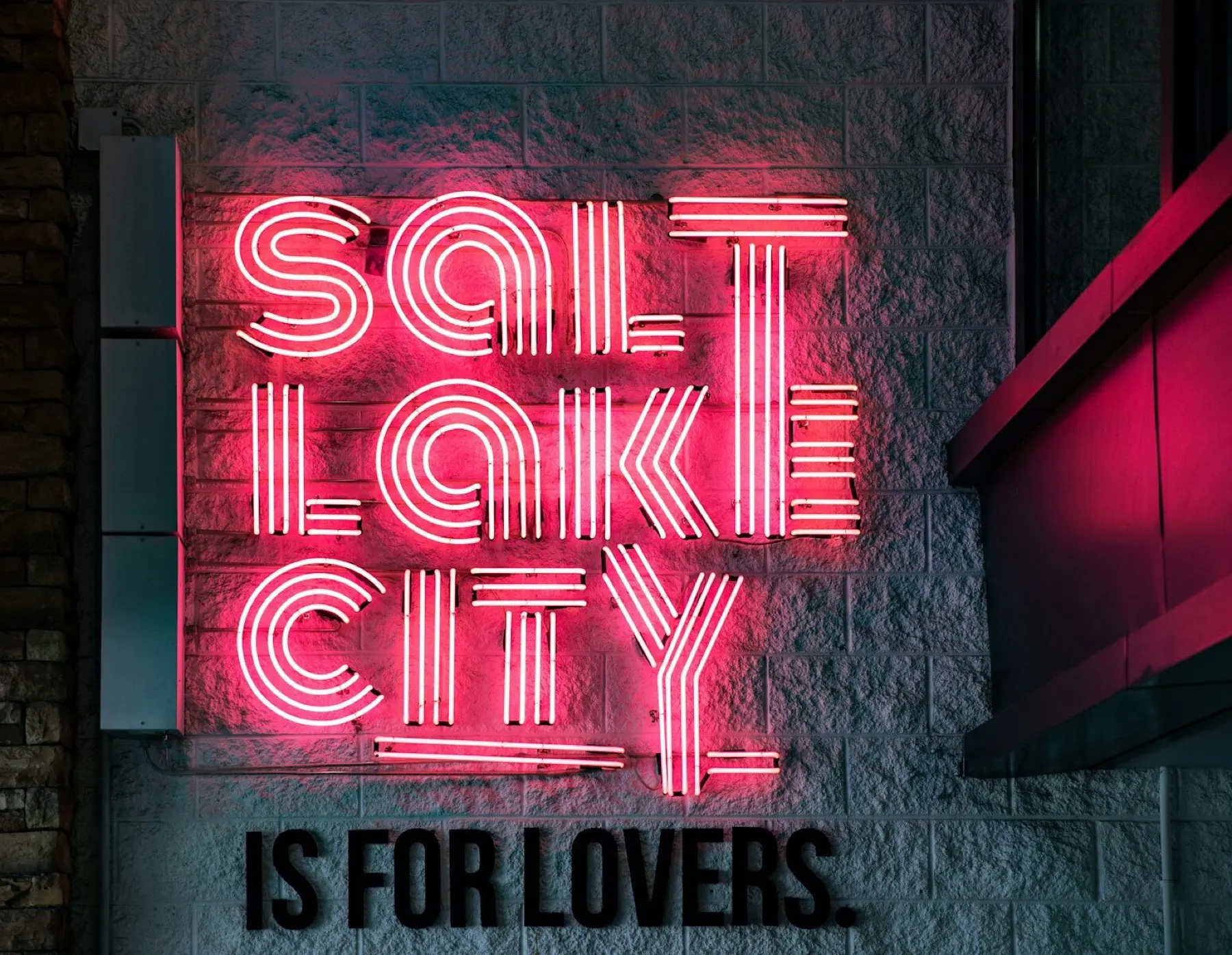 A neon sign reading Salt Lake City is for lovers