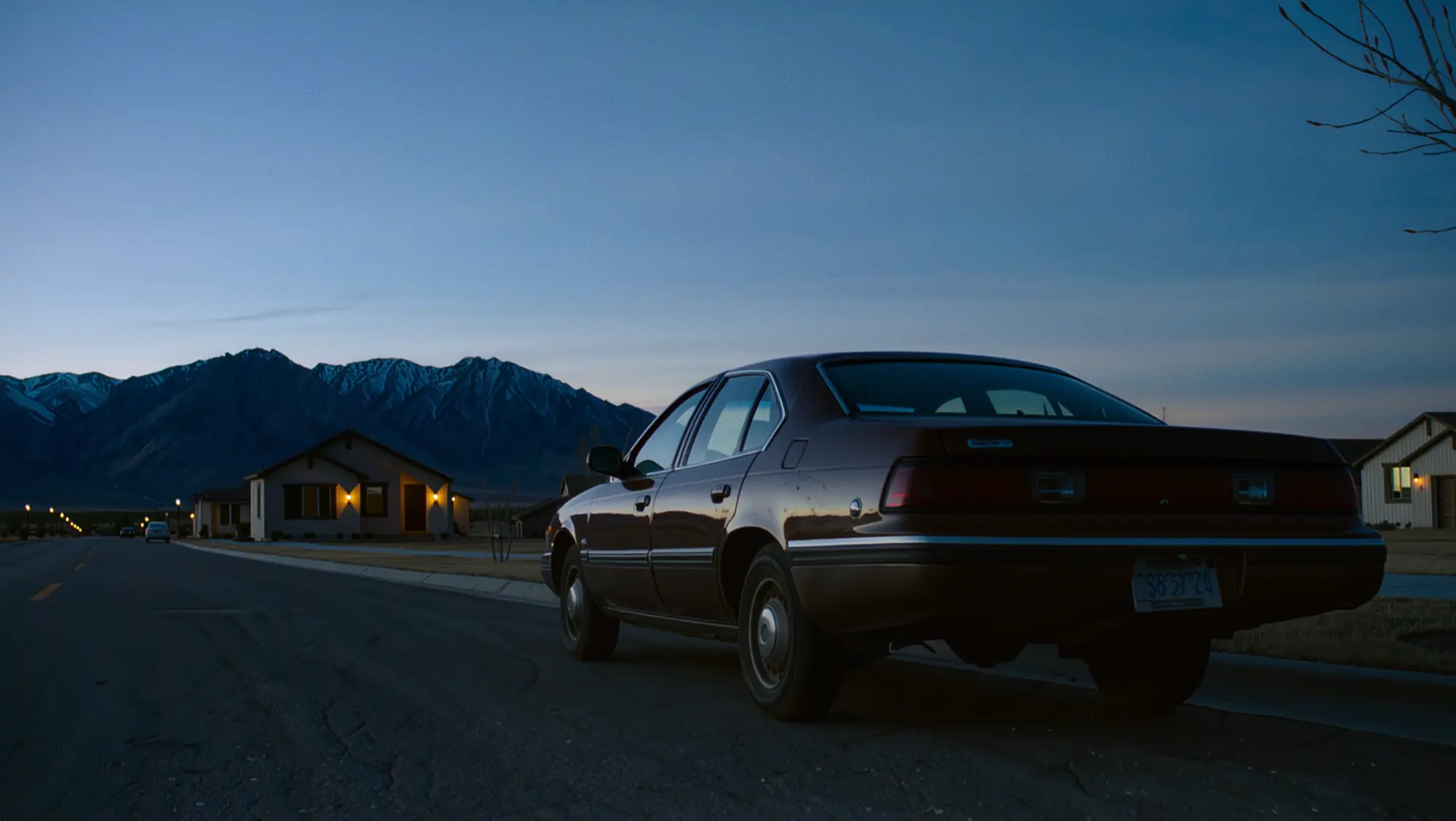 A deputy’s vehicle on a Utah street at dusk